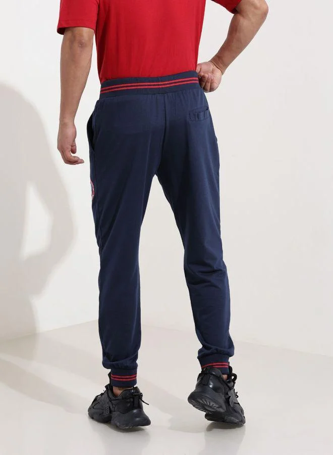 ذا انديان كراج كو Men Regular Fit Bugs Bunny Printed Side Pocket Mid-Rise Joggers